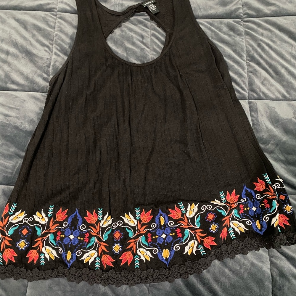 Black Torrid tank with floral detail